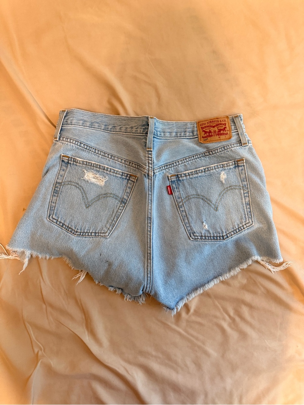 Levi's Light Wash High-Rise Distressed Denim Shorts